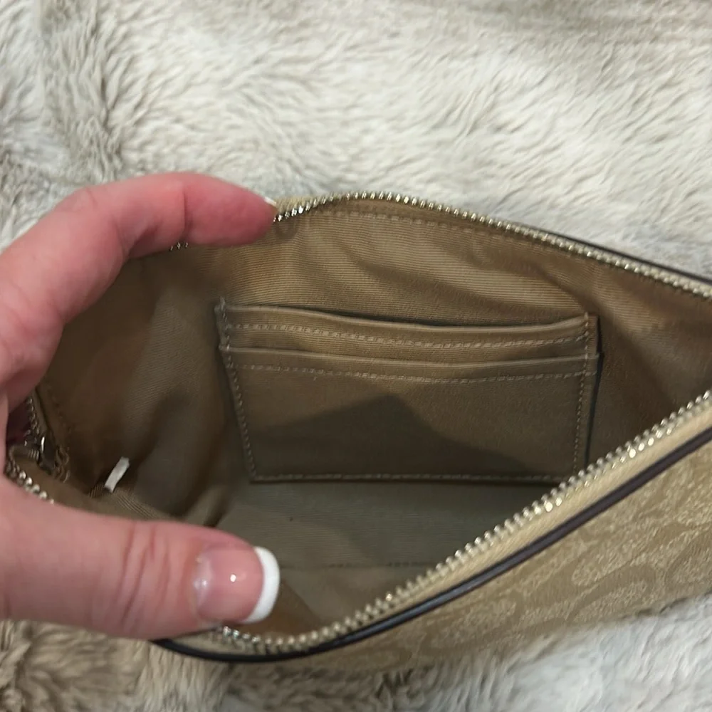 Coach wristlet with classic‎ C logos